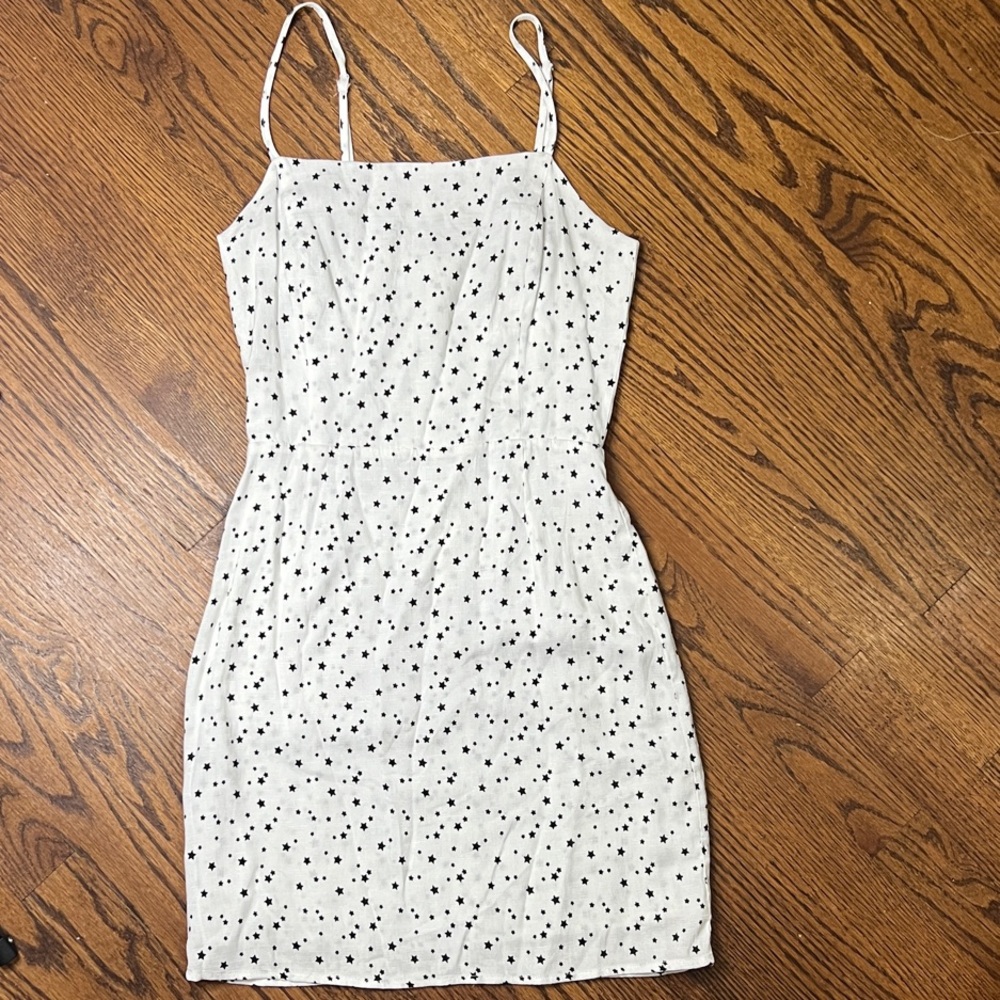 Storia White Mini Dress with Black Star Design